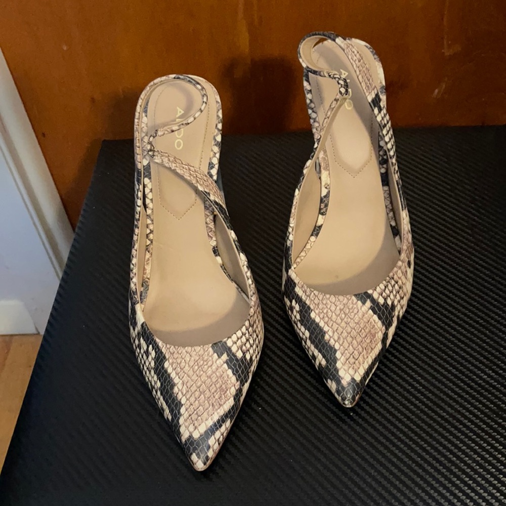 Aldo Snake Skin Slinbacks with Clear Heals.